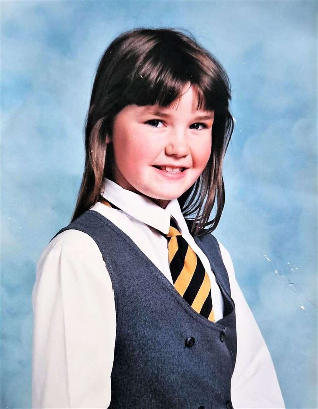 A school photo of Lynn in her Rothes Primary School uniform and at around the same age as when she wrote the message.