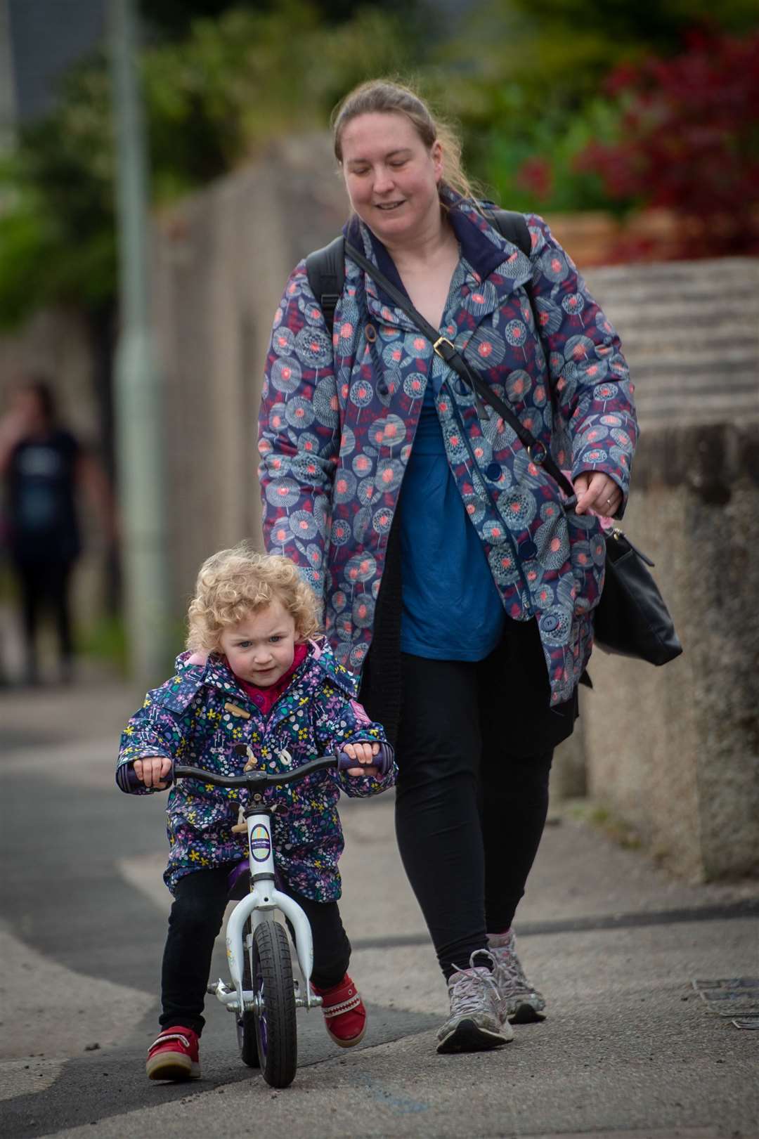 A pedestrian mum and wheeling child in Inverness. Picture: Callum Mackay