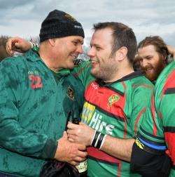 Dave Carson celebrates with captain Kevin Brown. Pictures: Gair Fraser.