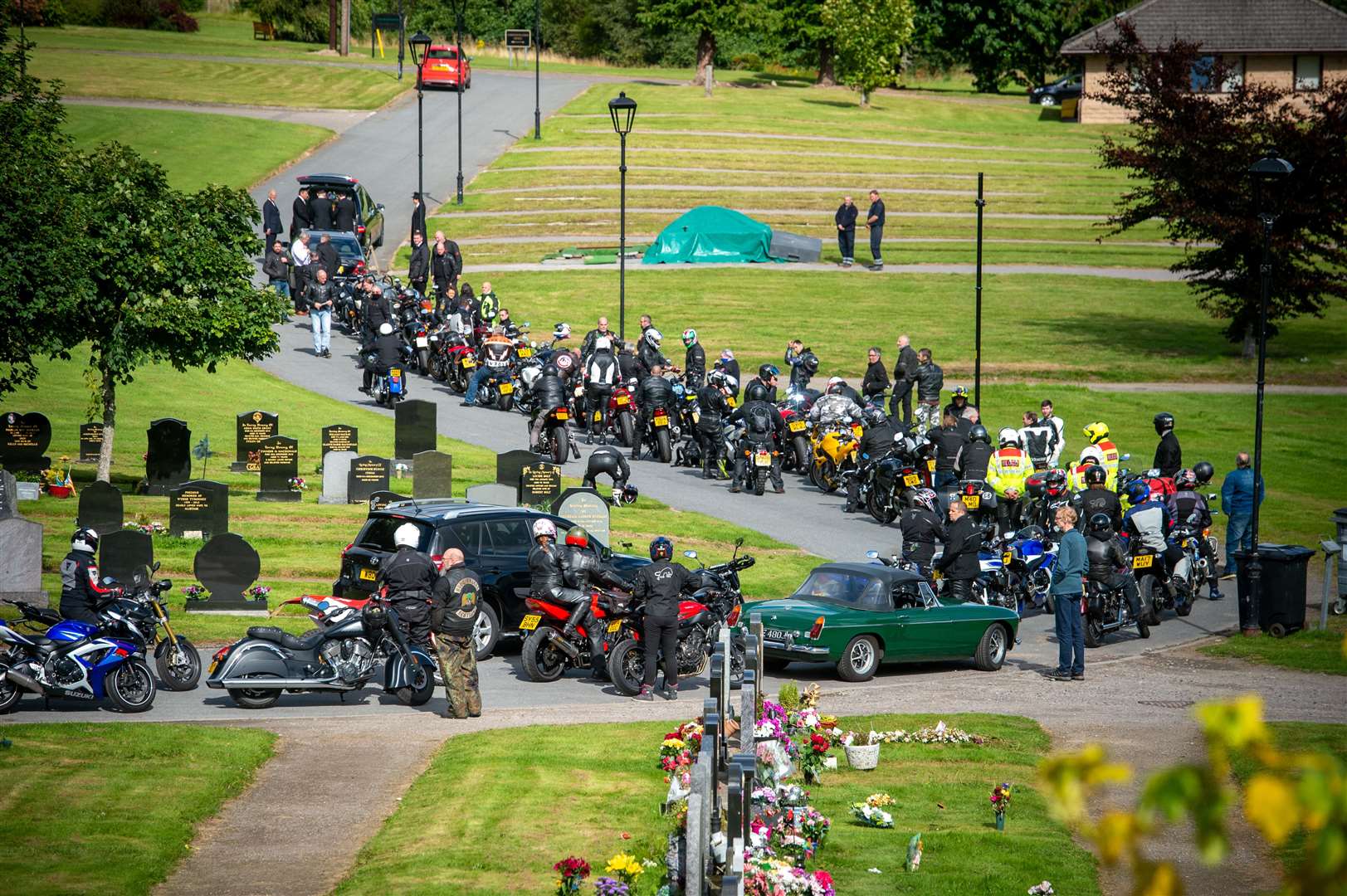 the funeral of John Birrell. A funeral procession of bikes to follow him to Kilvean cemetery..