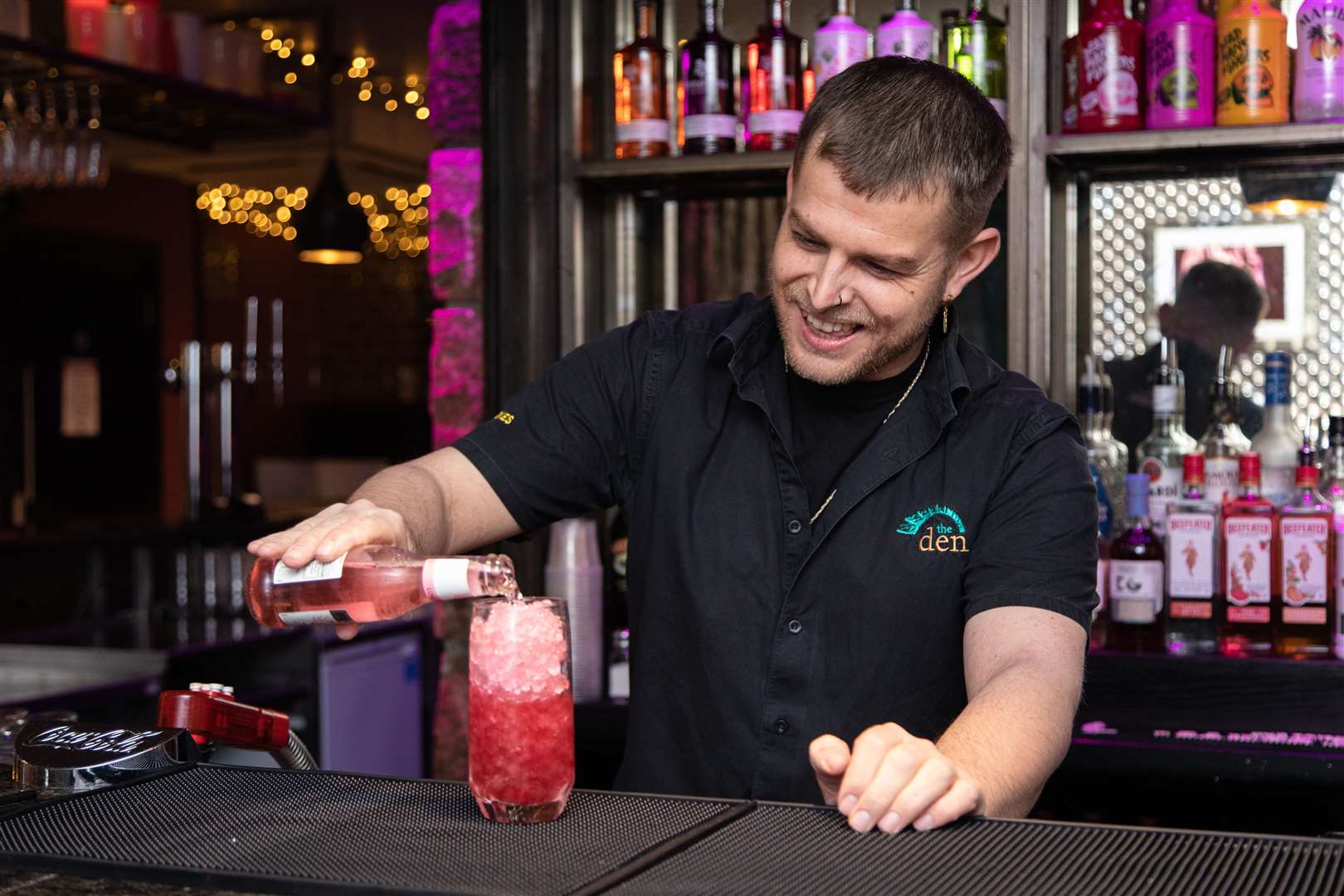 Andrew Gill prepares a special Bend and Snap cocktail at Johnny Foxes in Inverness.