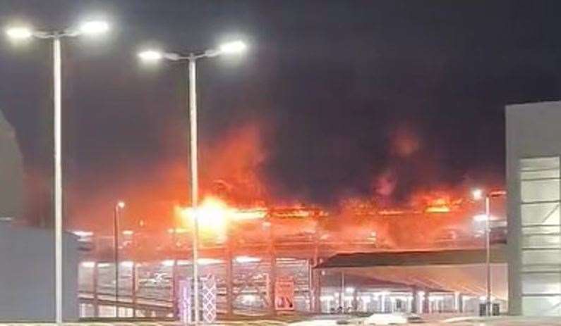 Screen grab taken with permission from video posted on Twitter of a fire at a car park at Luton Airport (@Soriyn23/PA Wire)