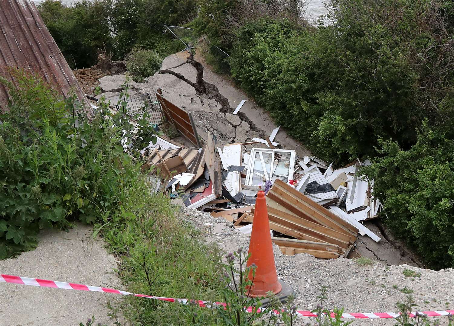 A landslip caused a bungalow to collapse towards the sea in an incident last year (Gareth Fuller/PA)