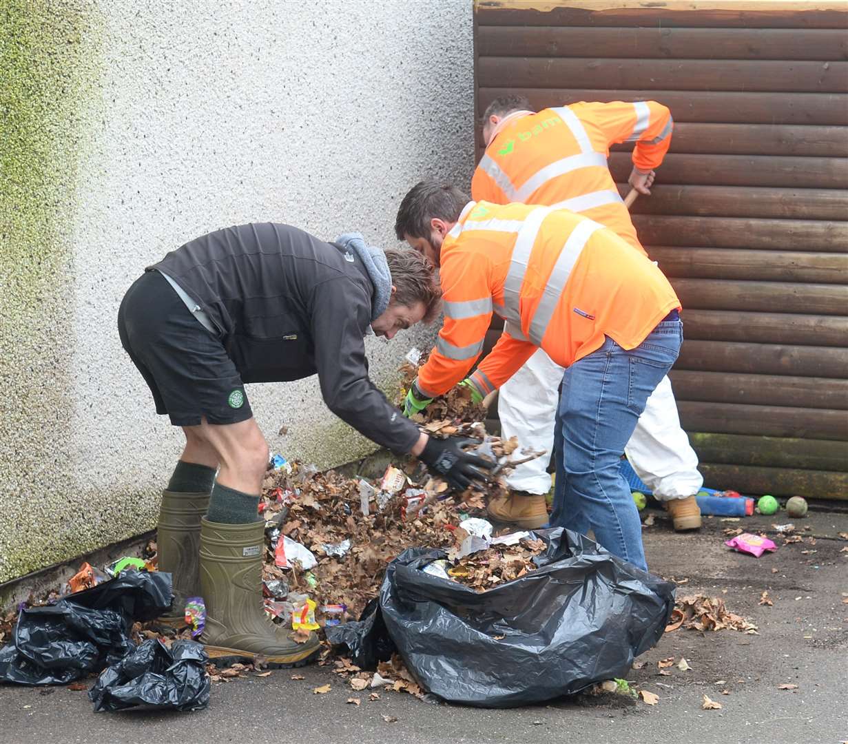A squad of volunteers from the local BAM Nuttal works undertaking voluntary maintenance works around Cradlehall Primary.Any tidying up is tackled.Picture Gary Anthony.