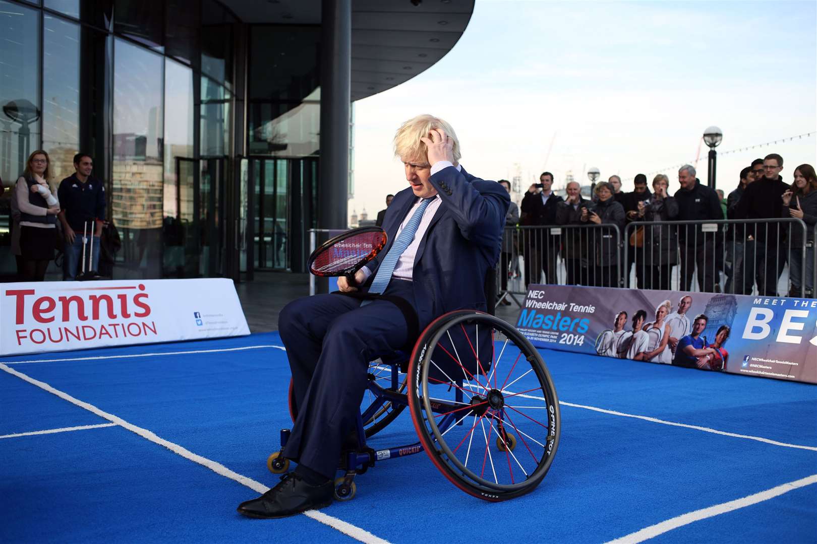 During the 2012 Paralympics when he was Mayor of London, Mr Johnson joined some of world’s best wheelchair tennis players outside City Hall (Steve Parsons/PA)