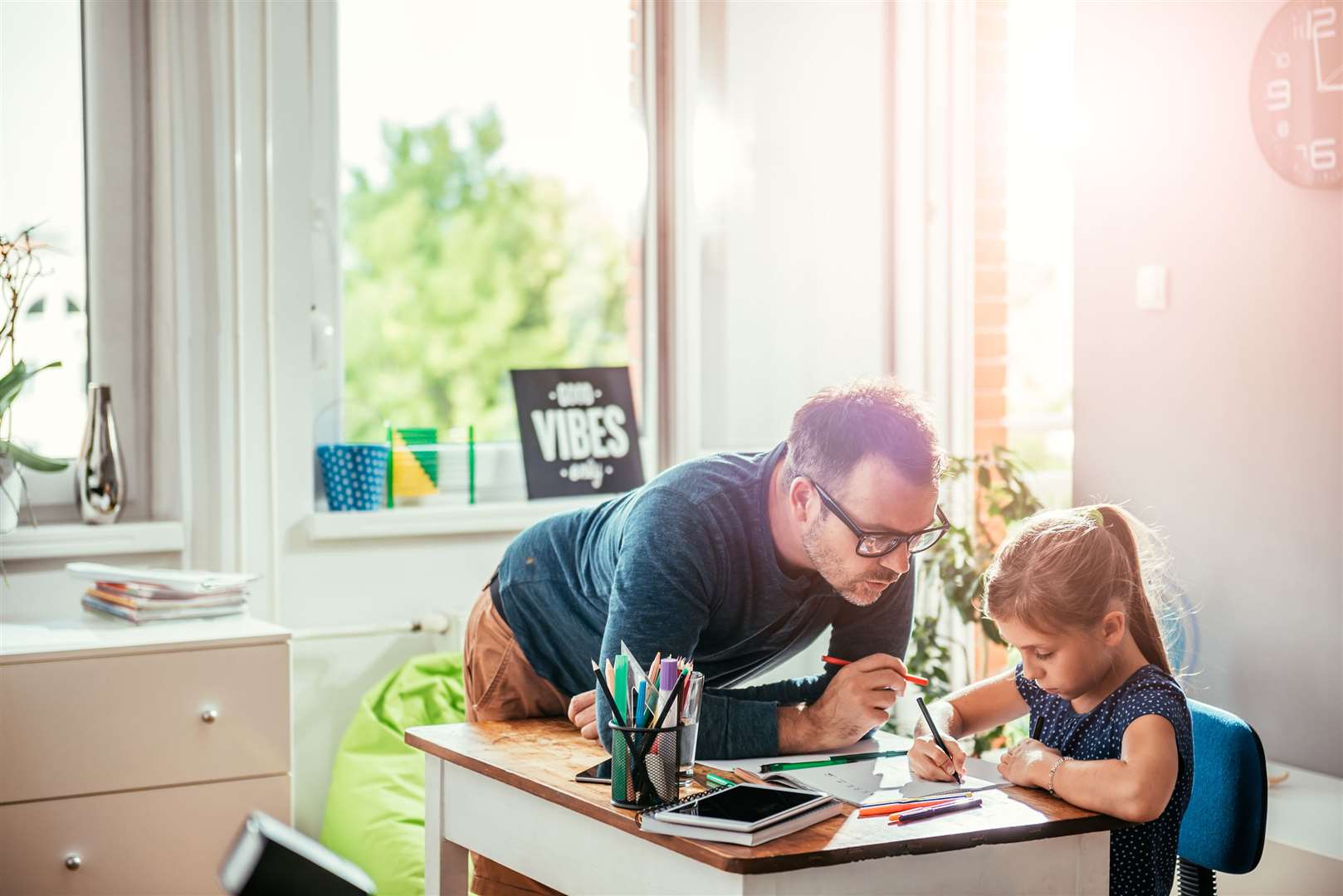 Juggling home-schooling with working from home, on top of myriad household tasks, can keep families busier than ever. Picture: iStock/PA
