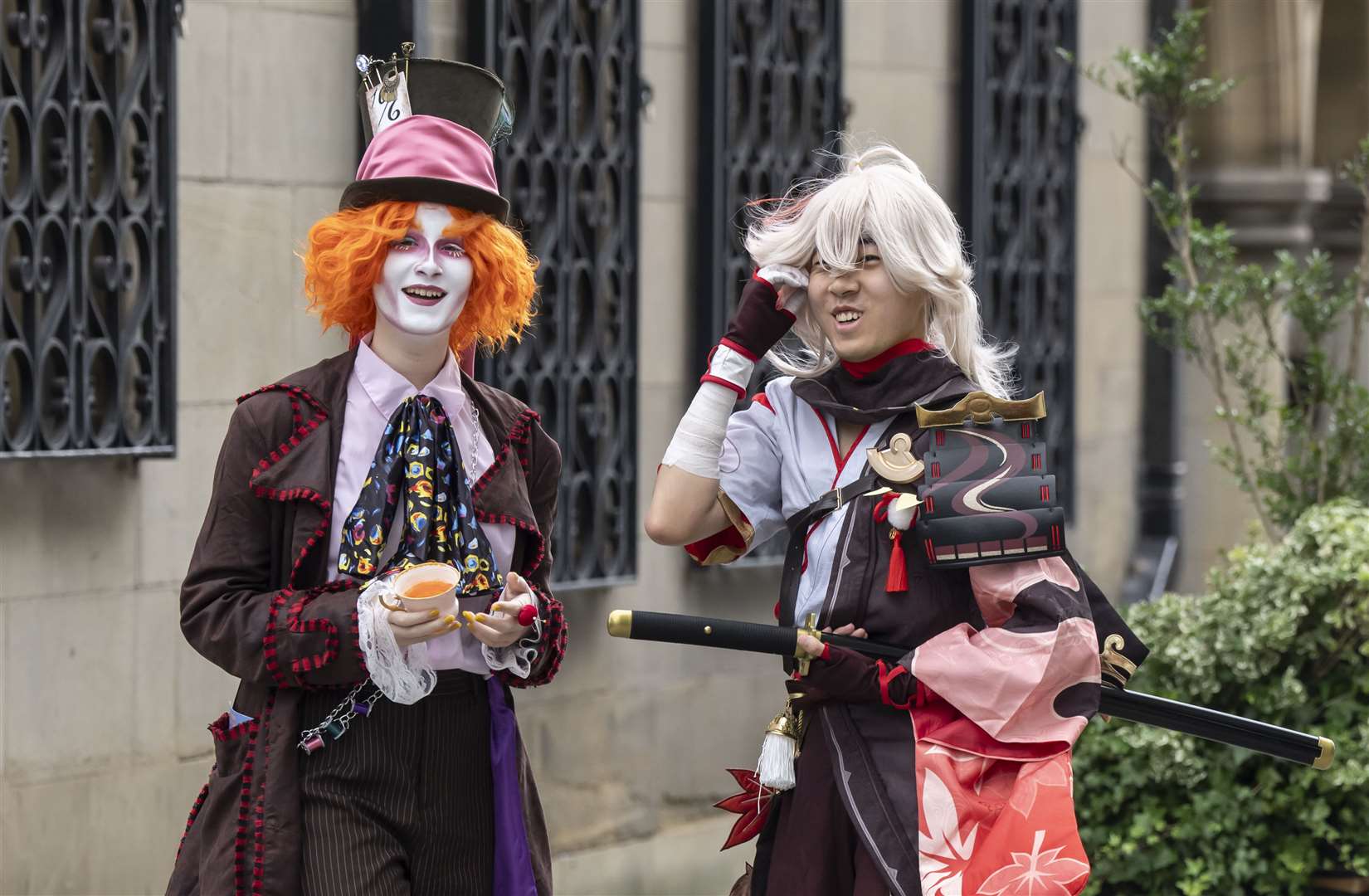 People dressed as The Mad Hatter and Kazuha from Genshin Impact (Danny Lawson/PA)