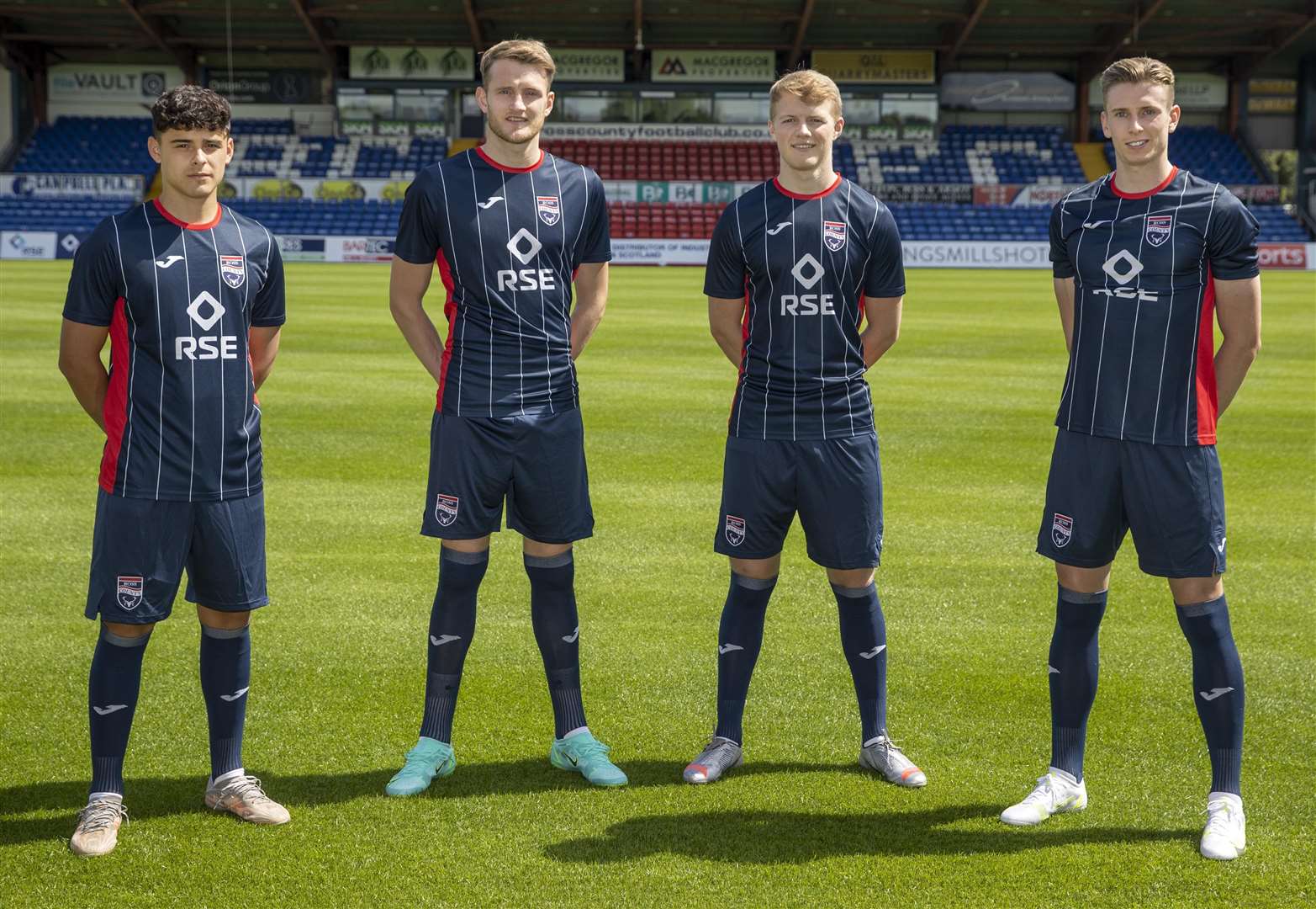Picture - Ken Macpherson, Inverness. See story. Ross County yesterday (Thurs) launched their new home kit for the 2021/22 Premiership season. Ross County’s newest loan signing Alexander Robertson (left) modelled the new kit, alongside (l to r) defenders Coll Donaldson, Tom Grivosti (left) and striker Oli Shaw.