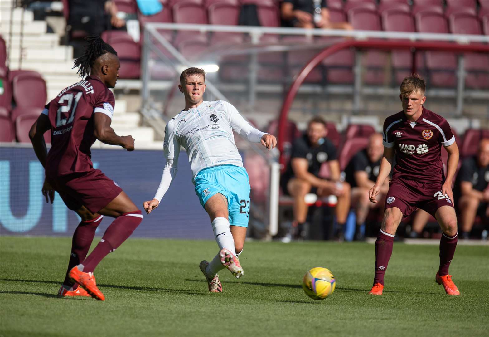 25.07.2021 Hearts v Inverness CT: Reece McAlear with Armand Gnanduillet and Finlay Pollock