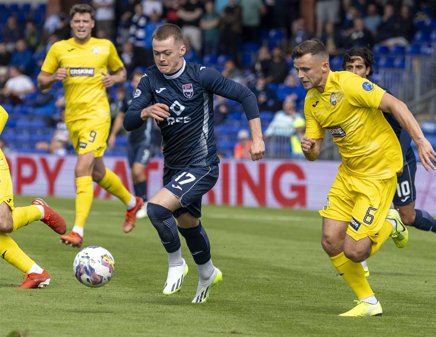 Picture - Ken Macpherson. SCOTTISH LEAGUE CUP (Viaplay Cup) group stage: Ross County(2) v Morton(1). 22.07.23. Ross County's Jay Henderson gets past Morton's Calum Waters.
