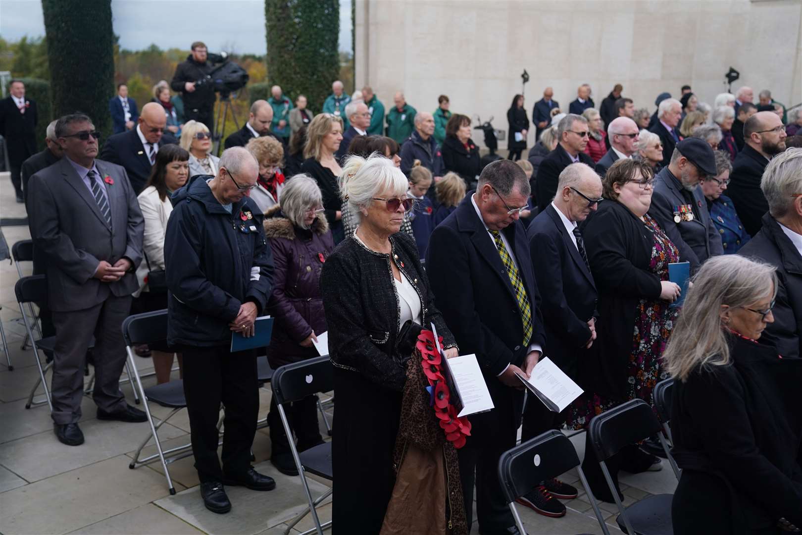 Members of the armed forces, veterans and the public observe a two-minute silence (Jacob King/PA)