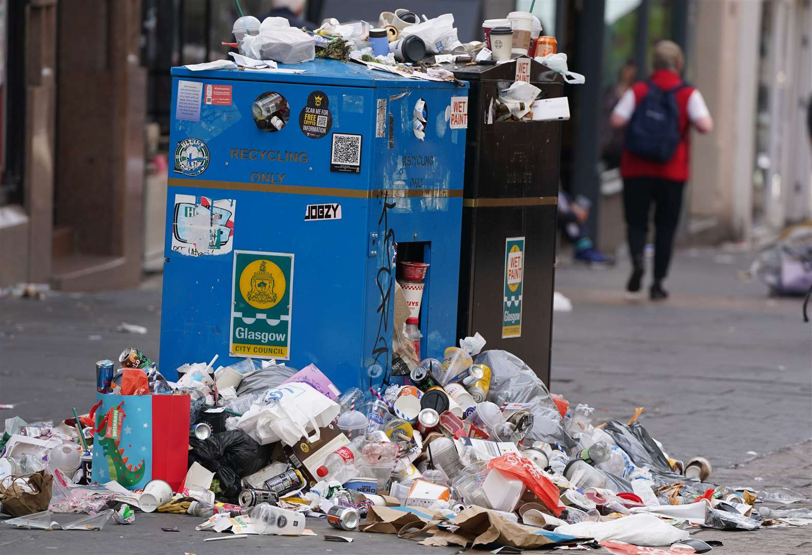Rubbish piled up in the streets as waste workers walked out over the pay deal (Andrew Milligan/PA)