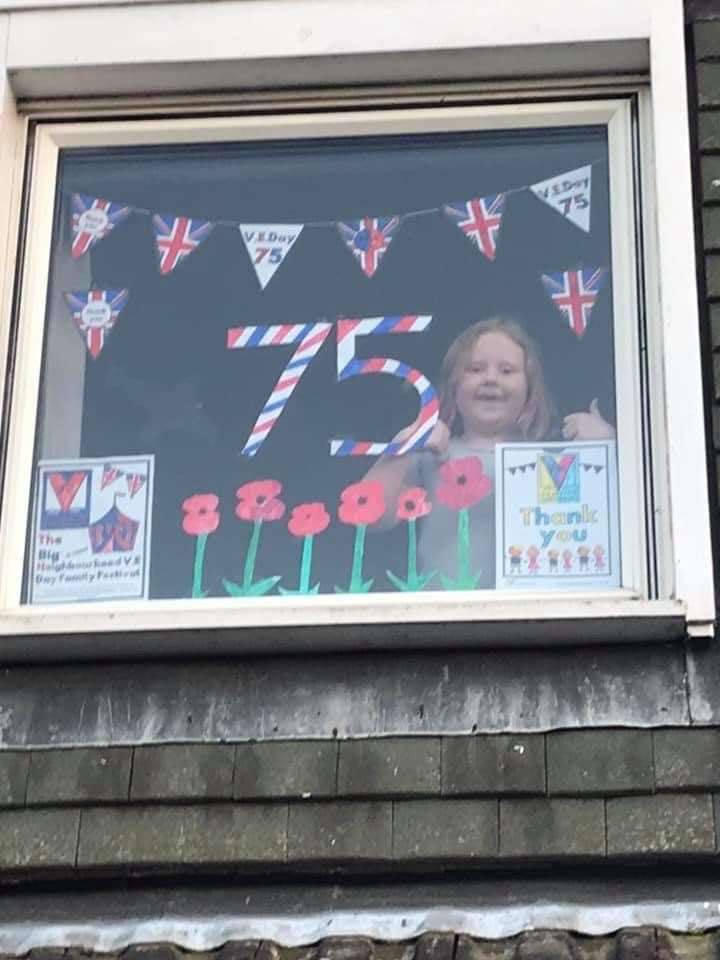 A thumbs up for VE Day celebrations from one young participant.