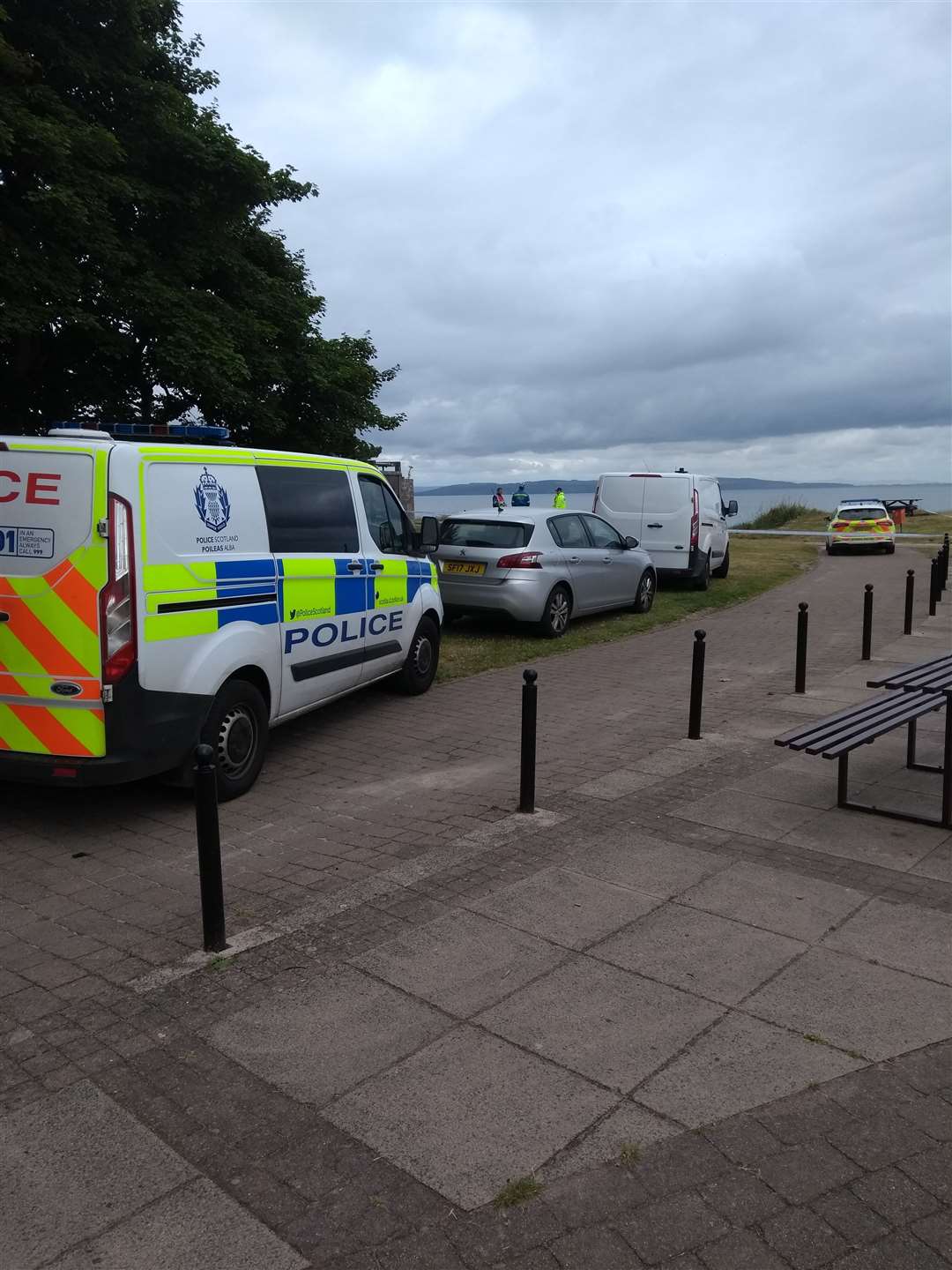 Police at the scene after a body was found in Nairn.