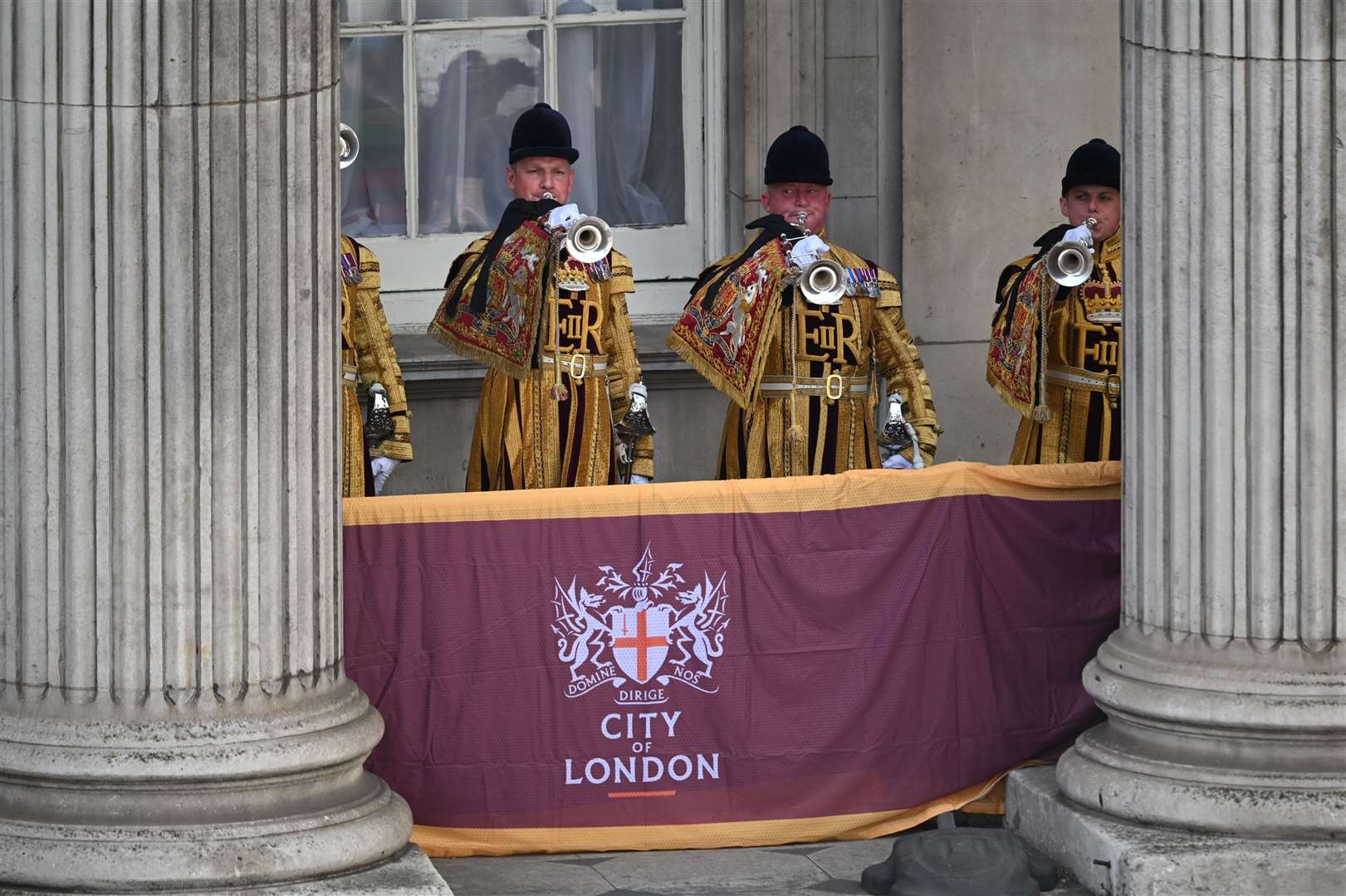 Trumpeters sound a Royal Salute during the Proclamation of Accession of King Charles III at the Royal Exchange (Leon Neal/PA)