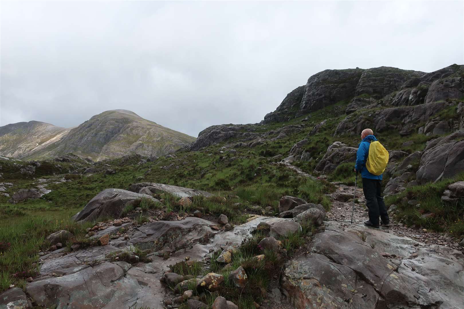 Peter at an unsocial distance heading up to Drochaid Coire Lair.