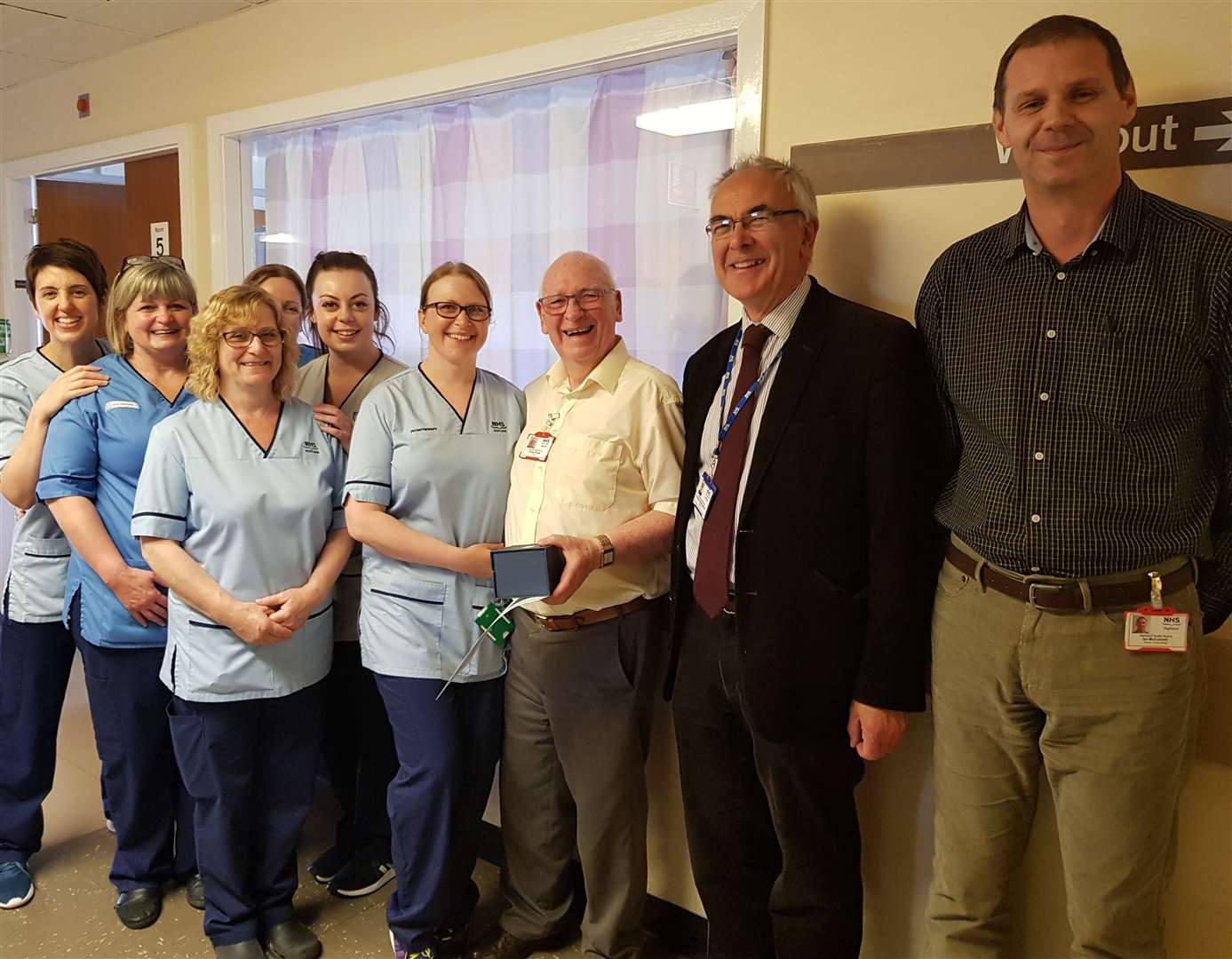 Raigmore Hospital volunteer George Beange (79) is honoured with a special award for his dedication and determination.