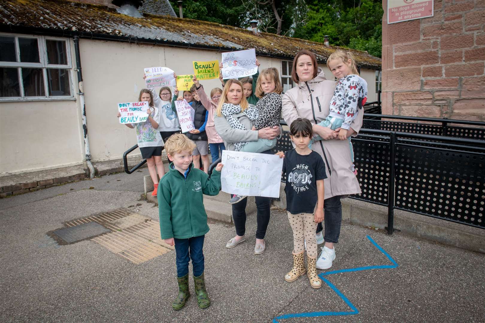 Lynsay Boyle, chairwoman of Beauly Primary School parent council, and Lauren Anderson, along with youngsters, campaign for a new school.