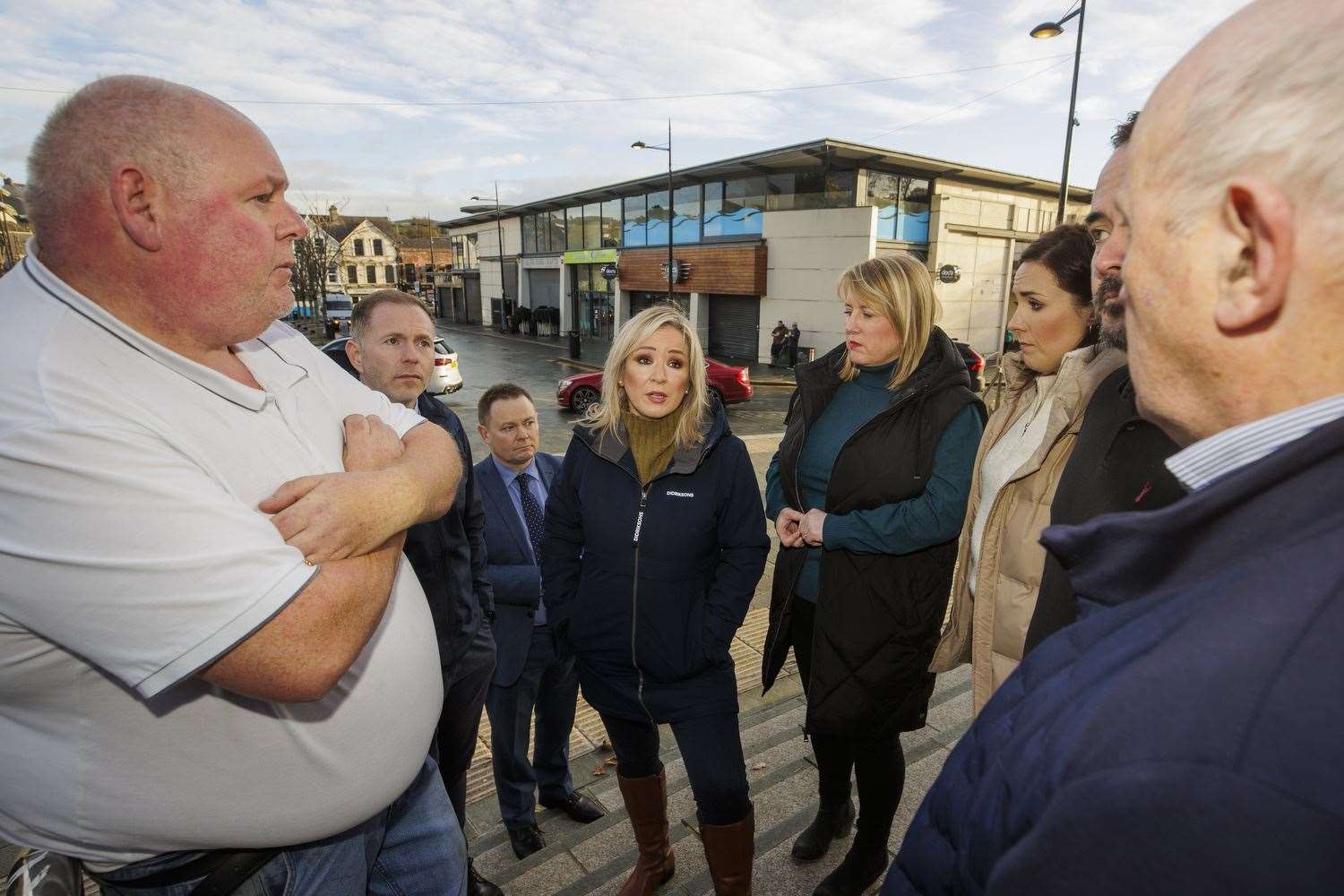 Sinn Fein vice president Michelle O’Neill (centre) speaking to local Downpatrick residents (Liam McBurney/PA)