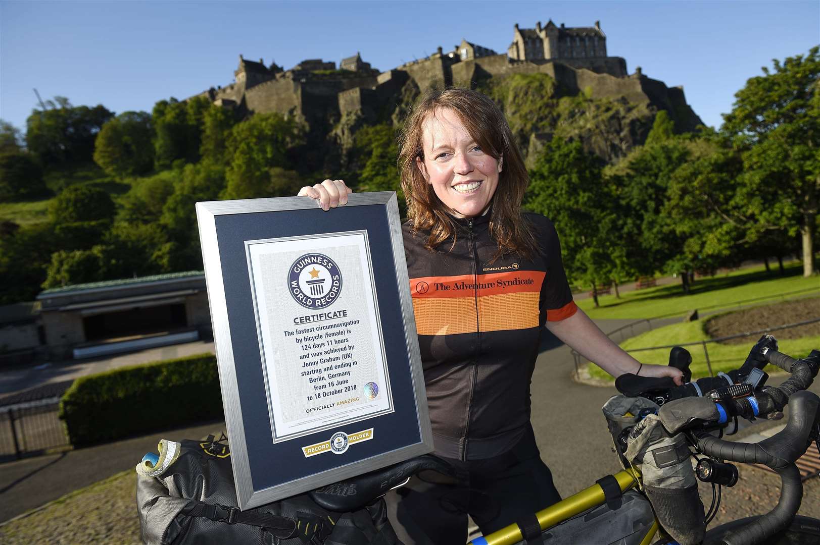 Jenny Graham in 2019, with her Guinness World Records title for the fastest circumnavigation by bicycle (female)