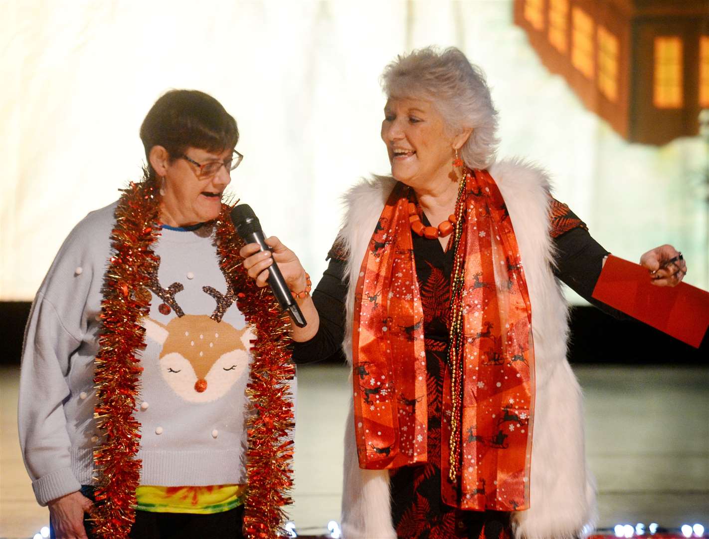 Mairi Hill joins Elsie Normington in a festive song.