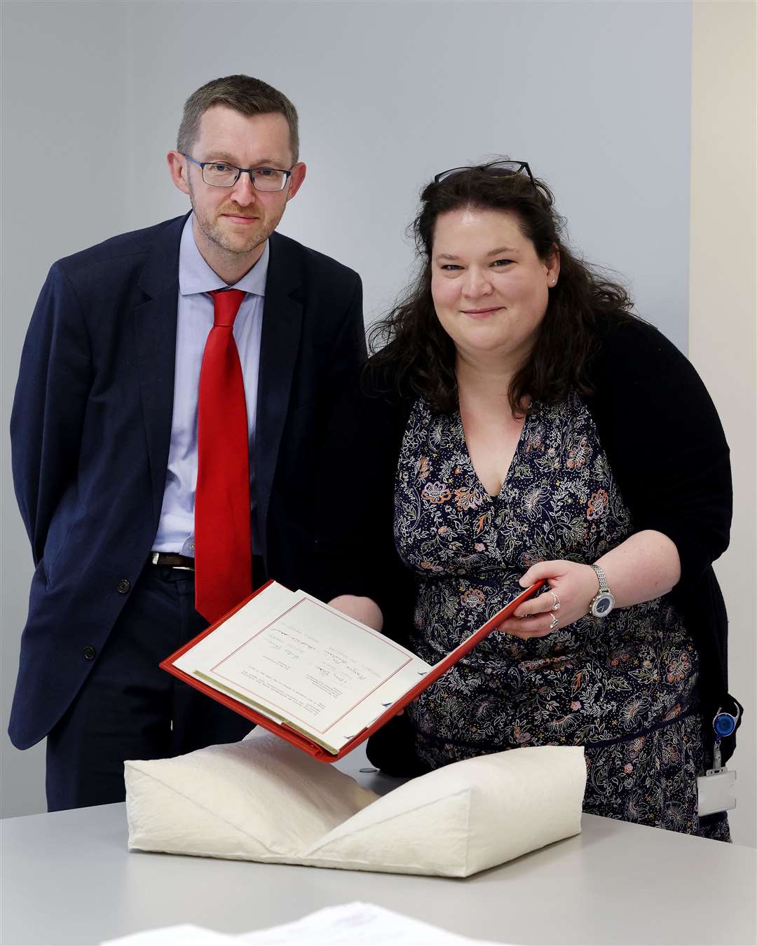 PRONI acting director David Huddleston and PRONI head of conservation Sarah Graham with the Good Friday Agreement treaty (Dept for Communities/PA)