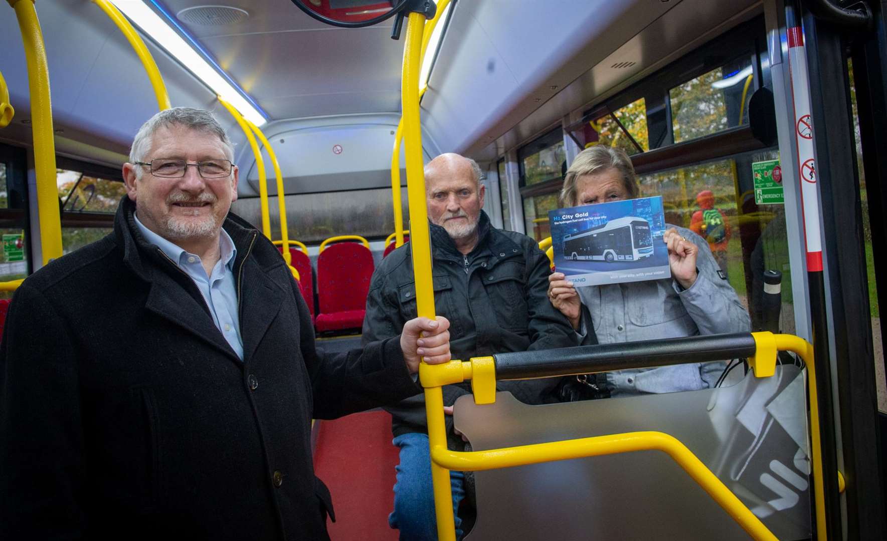 Tony Tomsett from Caetano with Brian and Bonnie Sime on the H2.City Gold hydrogen fuel cell bus.