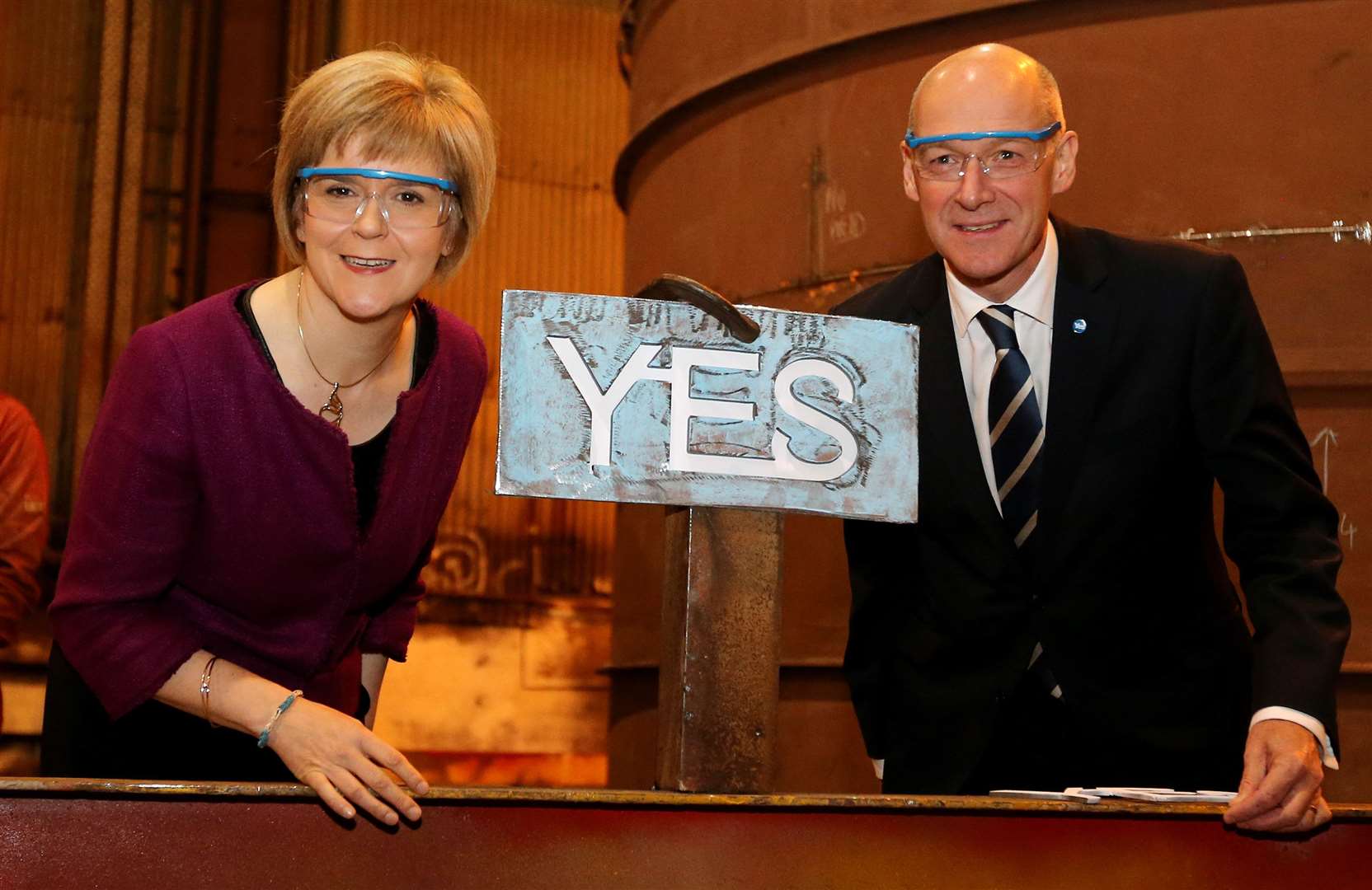 Mr Swinney and Nicola Sturgeon pose with a Yes sign ahead of the 2014 Scottish independence referendum (Lynne Cameron/PA)
