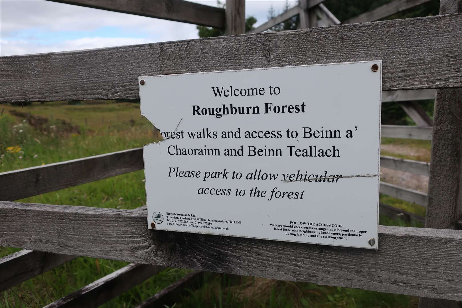 A welcome sign at the entrance to Roughburn Forest.