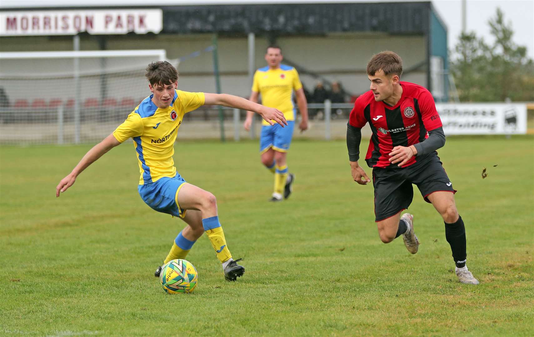 Halkirk United's Jonah Martens in action against Erlend Risbridger of Orkney at Morrison Park in October. The Anglers were due to host Inverness Athletic on Saturday but the game was called off on Friday evening. Picture: James Gunn