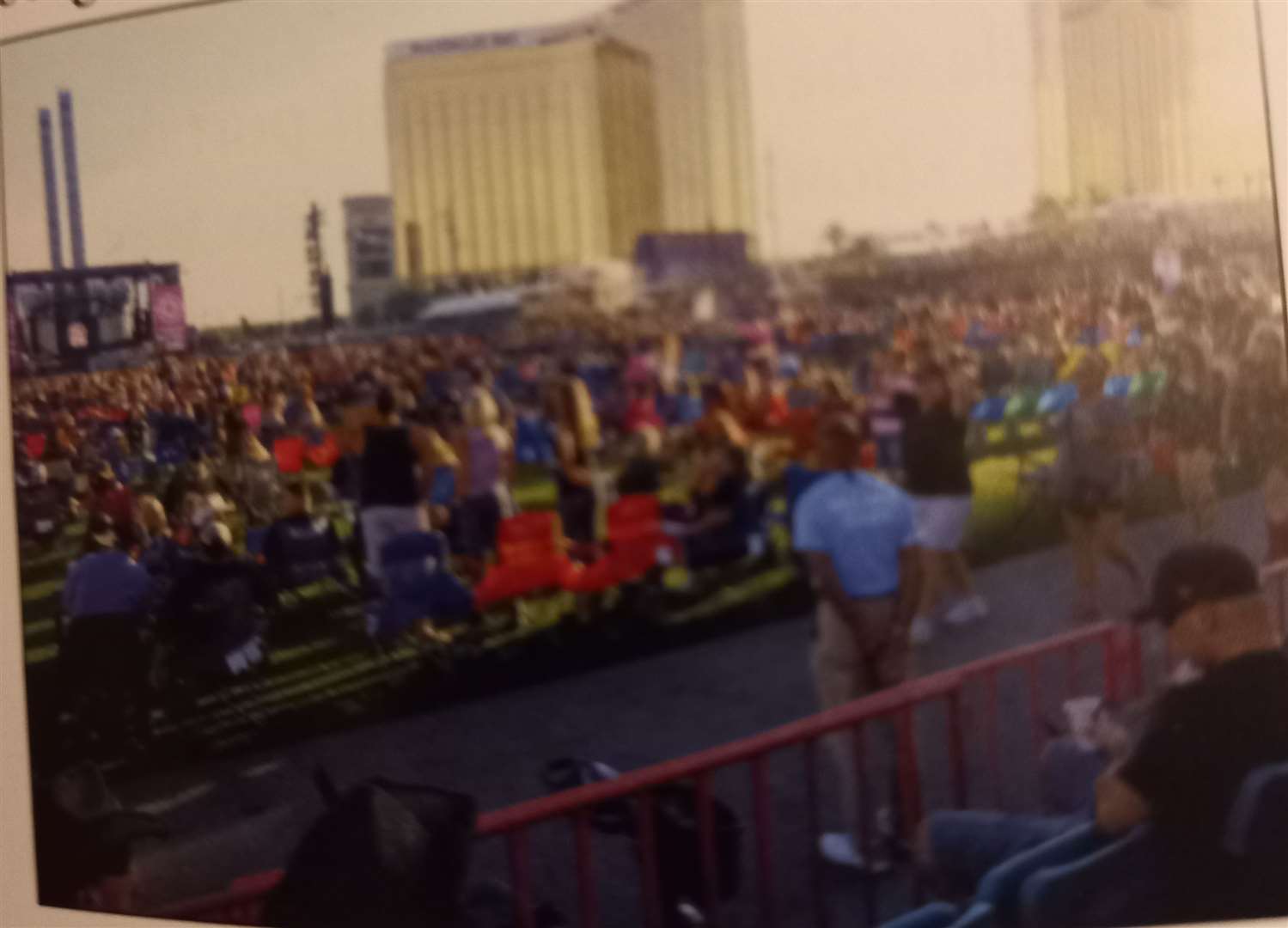 A picture showing the music festival in Las Vegas and at the back the hotel from where the shooter killed 58 people and injured over 600.