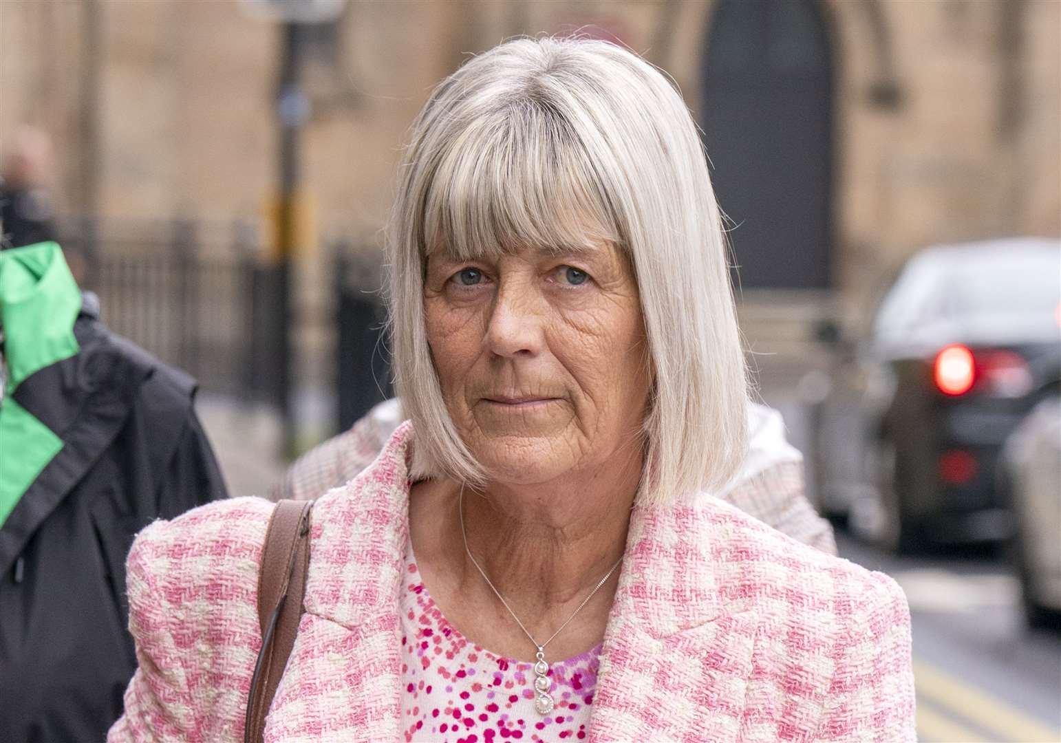 Jane Midgley, the mother of victim Simon Midgley, arrives at Paisley Sheriff Court on Friday (Jane Barlow/PA)