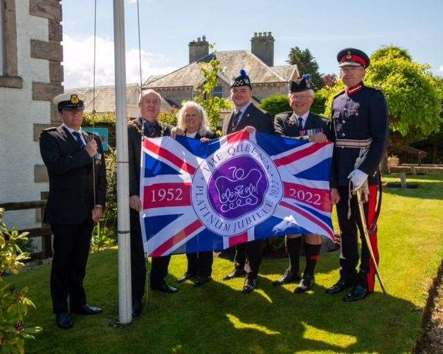 The Jubilee Flag is raised at Nairn Royal British Legion. Picture: Ian MacRae