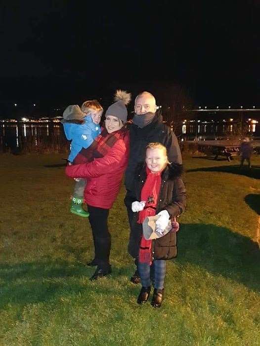 James Robertson with wife Megan and children Brodie and Blake.