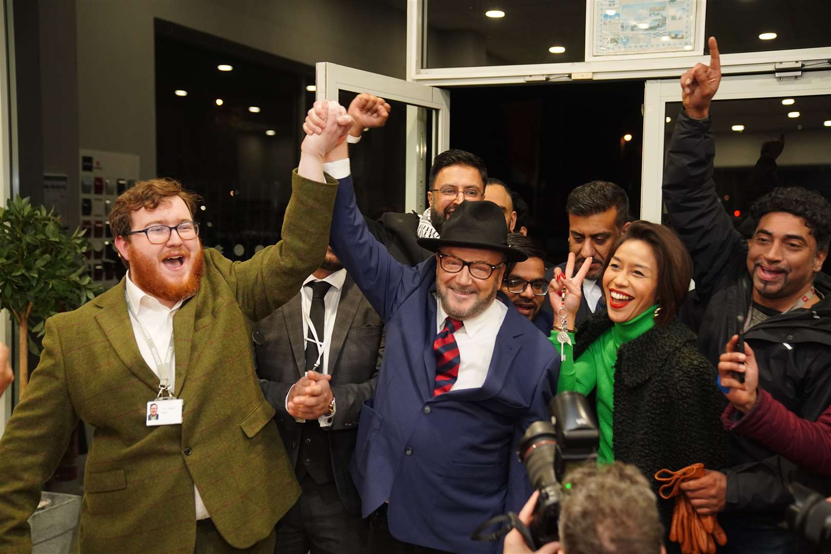 George Galloway holds a rally at his Rochdale Headquarters after being declared winner of the Rochdale by-election (Peter Byrne/PA)