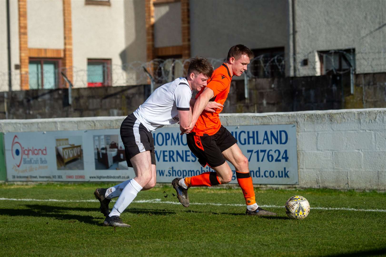 Clachnacuddin v Rothes, Grant Street Park, Inverness...Clach's Ryan MacIntosh stays close to Rothes wideman Craig Cormack..