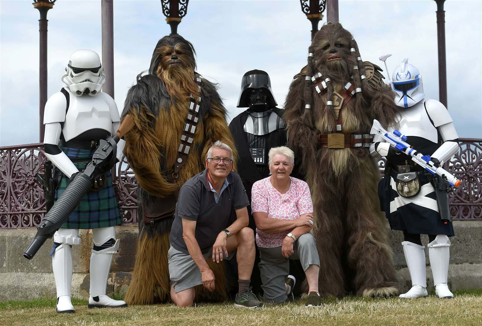 Nairn Games convener Sandra Ross and Donald Wilson are joined by Star Wars characters. Picture: Callum Mackay.