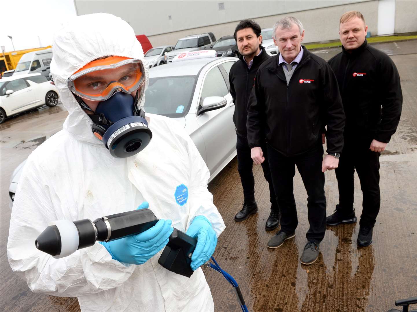 Inverness Taxis (IT) get disinfection and decontamination services to all vehicles and offices. From left, Zack Paterson of AMS Global with IT's Wojciech Kobialka, Gavin Johnston and Shaun Dougan. Picture: Gary Anthony