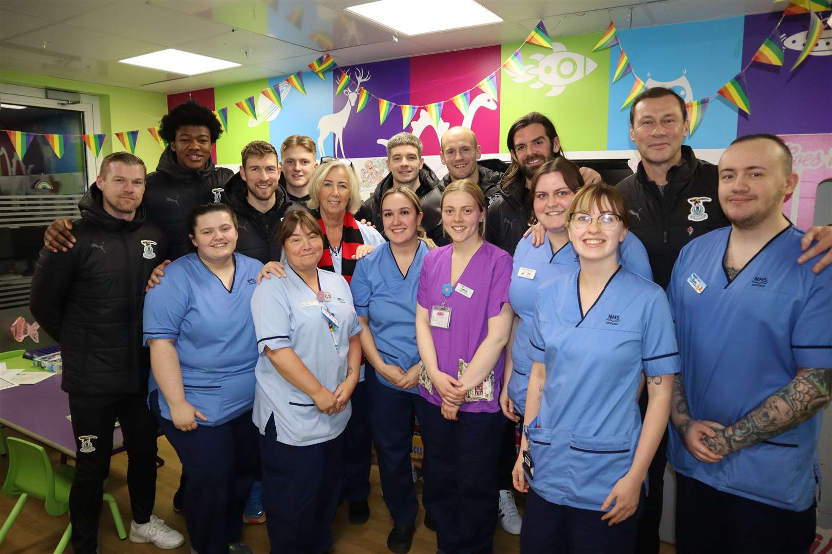 ICT players and manager Duncan Ferguson, right, with Raigmore Children's Unit staff.