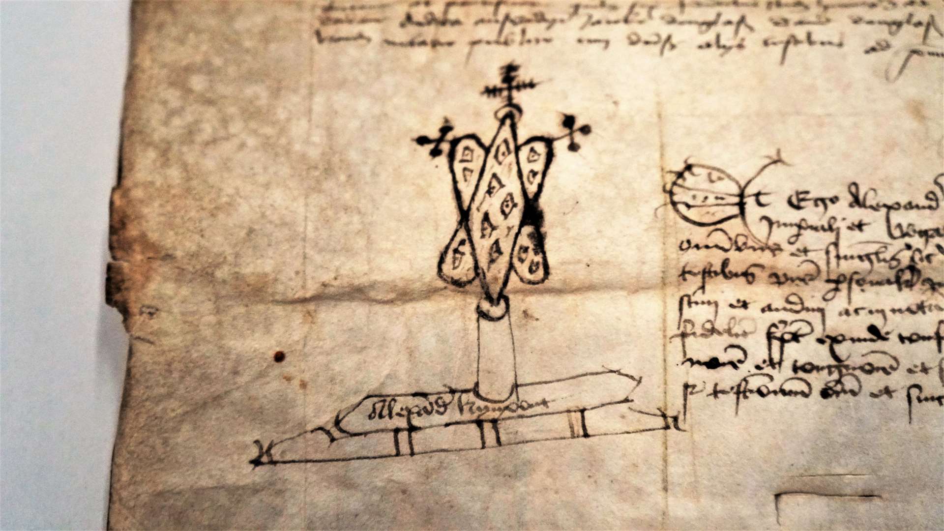 This strange device on the left hand side of the charter is actually a notarial signature and would add legal credence to it. Picture: DGS