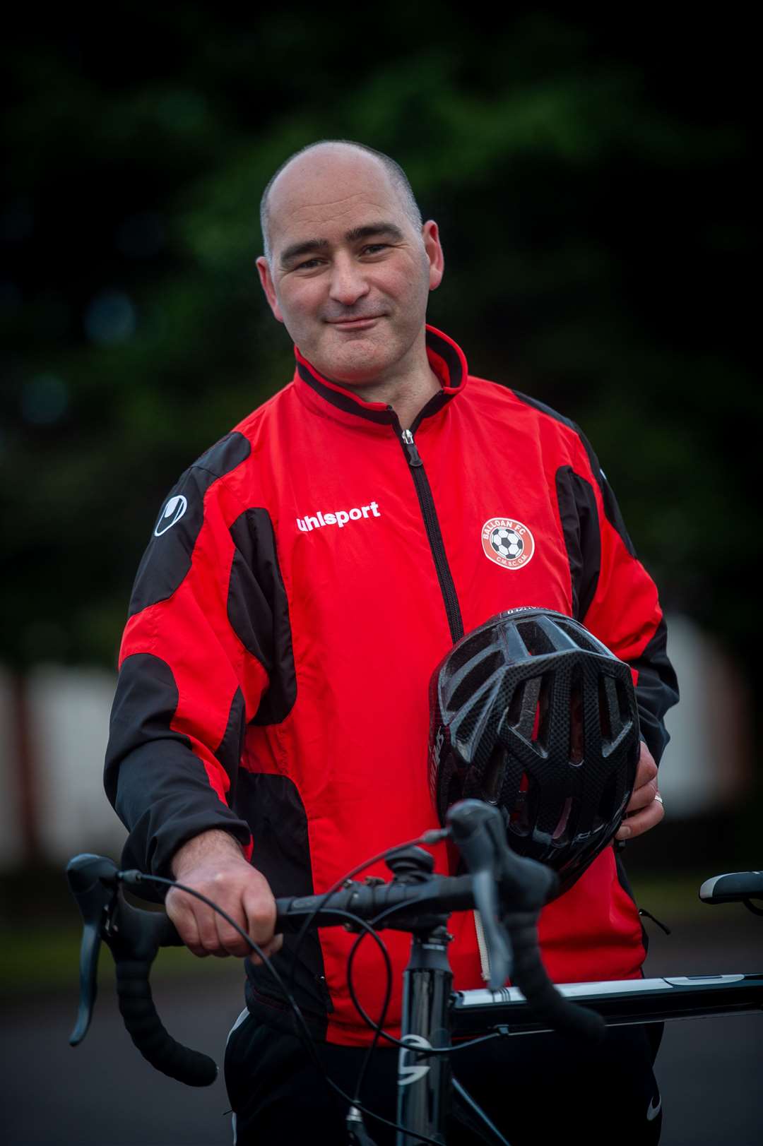 John MacKinnon - is cycling indoors and outdoors the equivalent of Inverness to Portugal for Balloan FC....Picture: Callum Mackay..