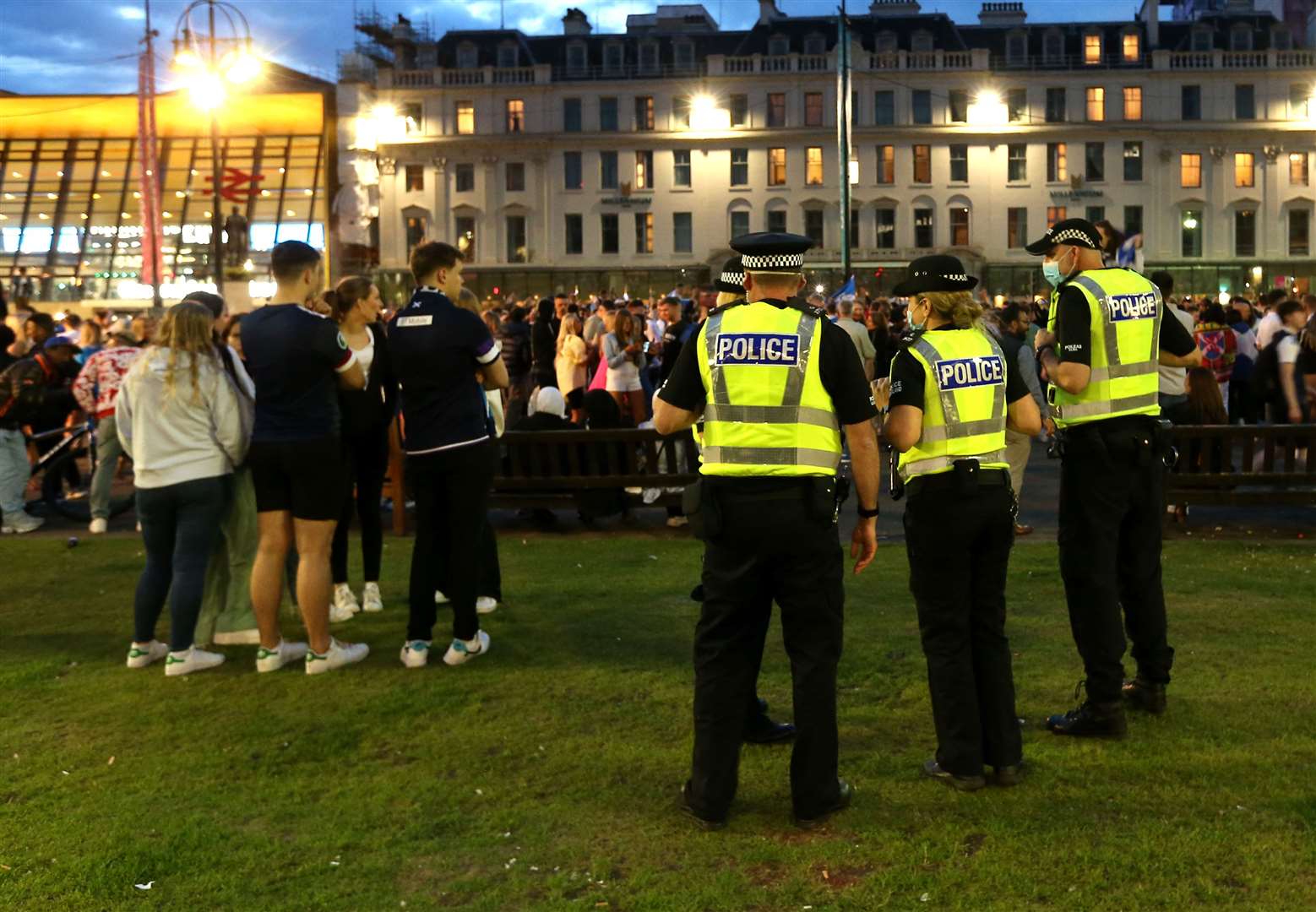 Police gather as Scotland fans celebrate in Glasgow (Robert Perry/PA)