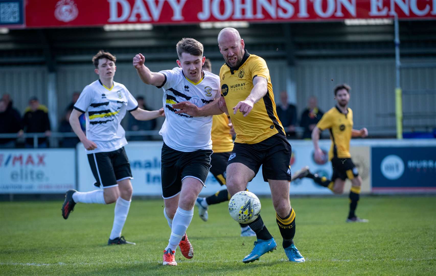 Ross Tokely (right) pictured in action for Nairn County. Picture: Callum Mackay.