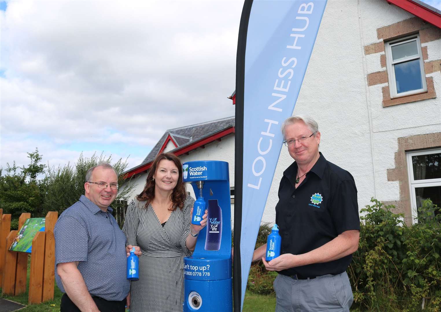 Highland Councillor David Fraser, Dianne Fraser, chairwoman of Glenurquhart Community Council, and Russell Fraser, manager of the Loch Ness Hub, welcome the installation of the new tap.
