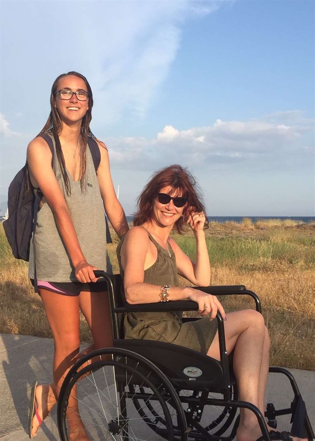 Nicky Marr in a wheelchair after a water skiing accident in Greece.