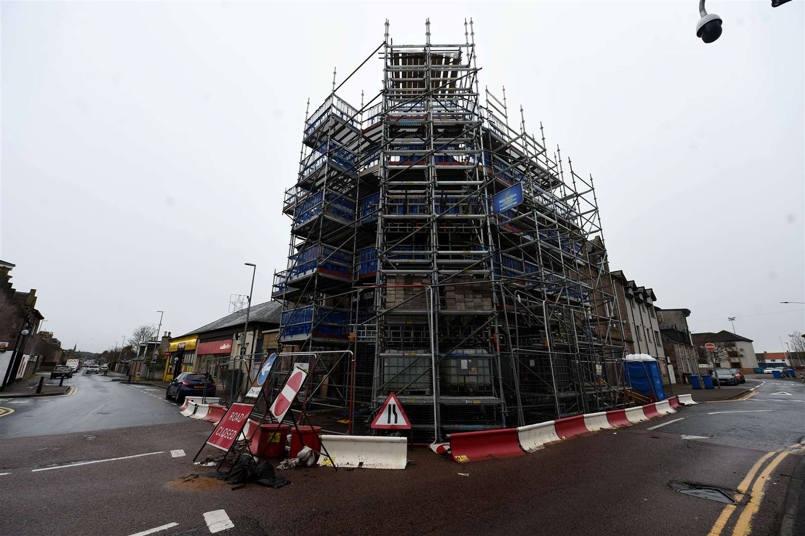 The building which was hit by the car was badly damaged and encased in scaffolding for months after the incident.