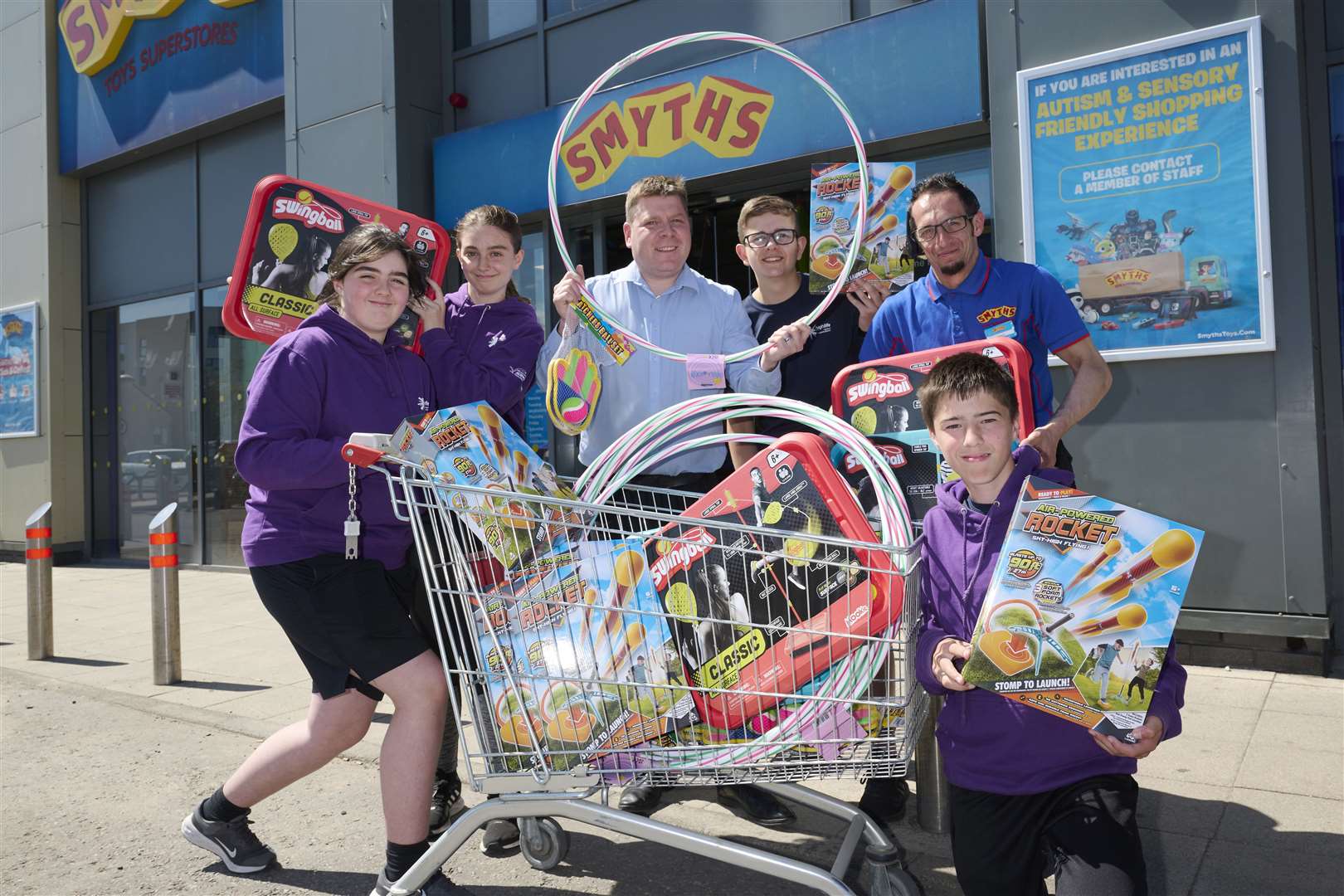 Barry Martin (third left) and Xisco Cejudo (second right) of Smyths, with (from left) High Life Highland Young Leaders Rosie Walker, Maisie Walker, Archie Webster and Ryan Lawrence-MacAskill.