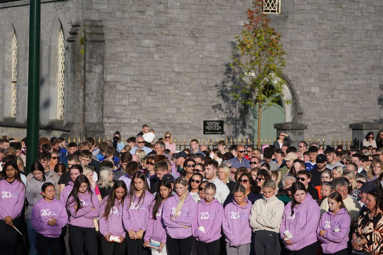 Pupils from the class of 2023 from Clonmel Presentation Secondary School attend the vigil (Brian Lawless/PA)