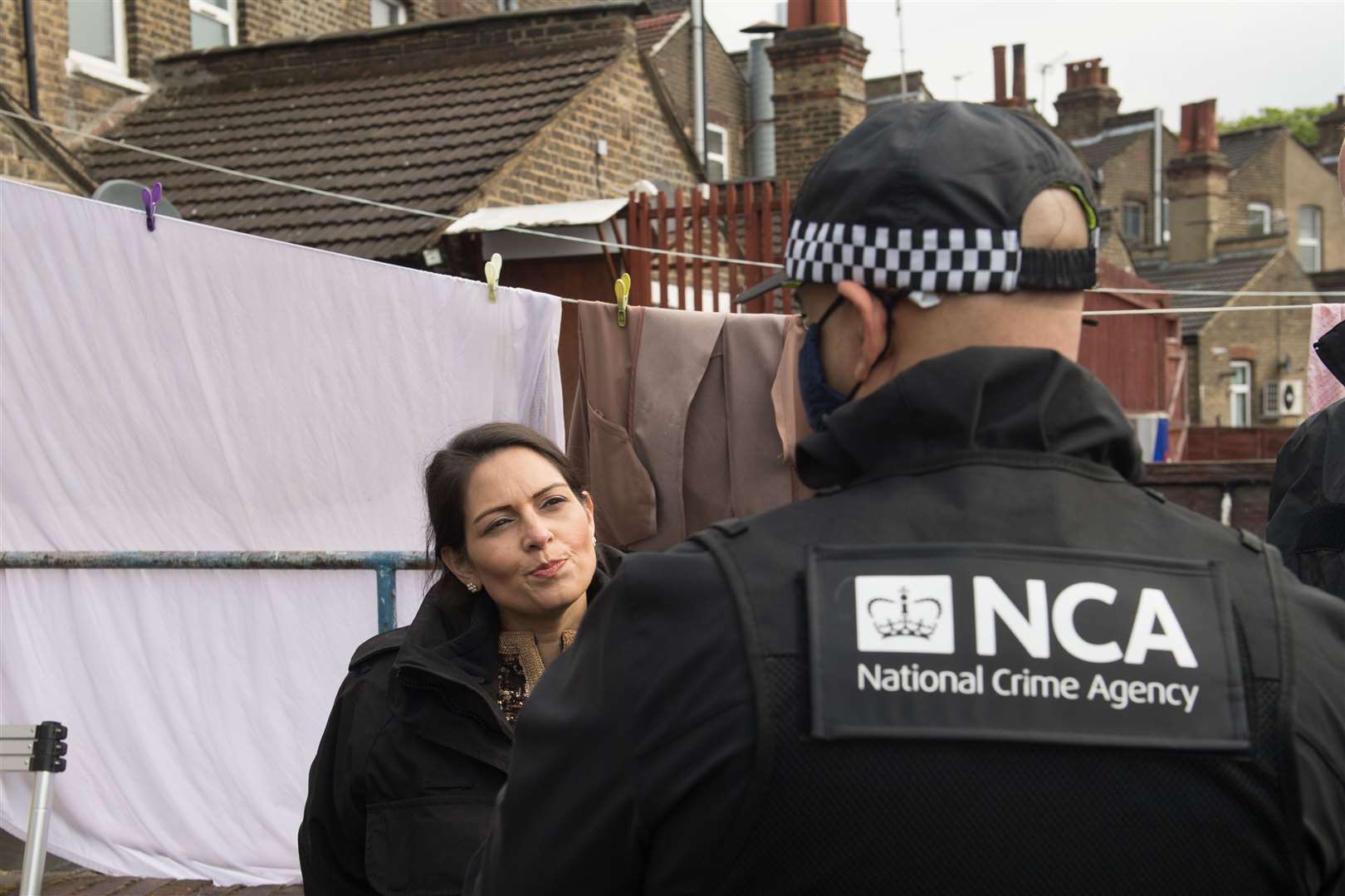 Home Secretary Priti Patel during a National Crime Agency operation (Stefan Rousseau/PA)