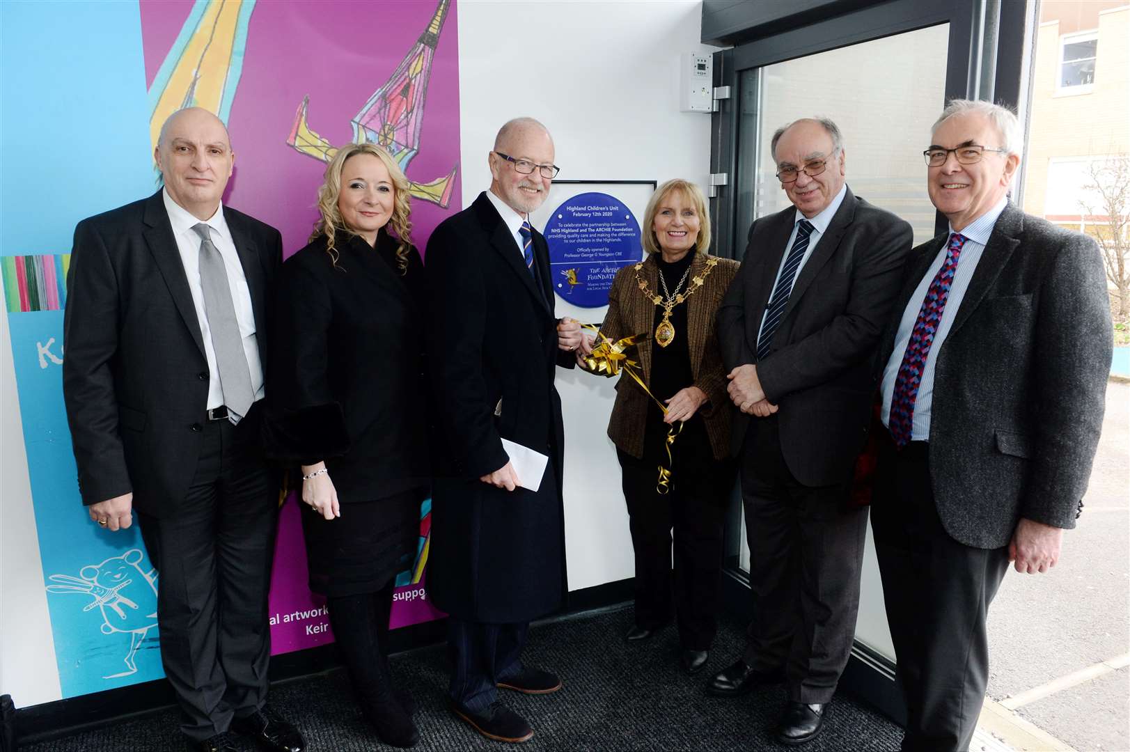 Celebrating the unveiling of the plaque are NHS Highland chief executive Paul Hawkins, Mary Nimmo, George Youngson, Inverness Provost Helen Carmichael, David Sutherland and NHS Highland chairman Boyd Robertson.